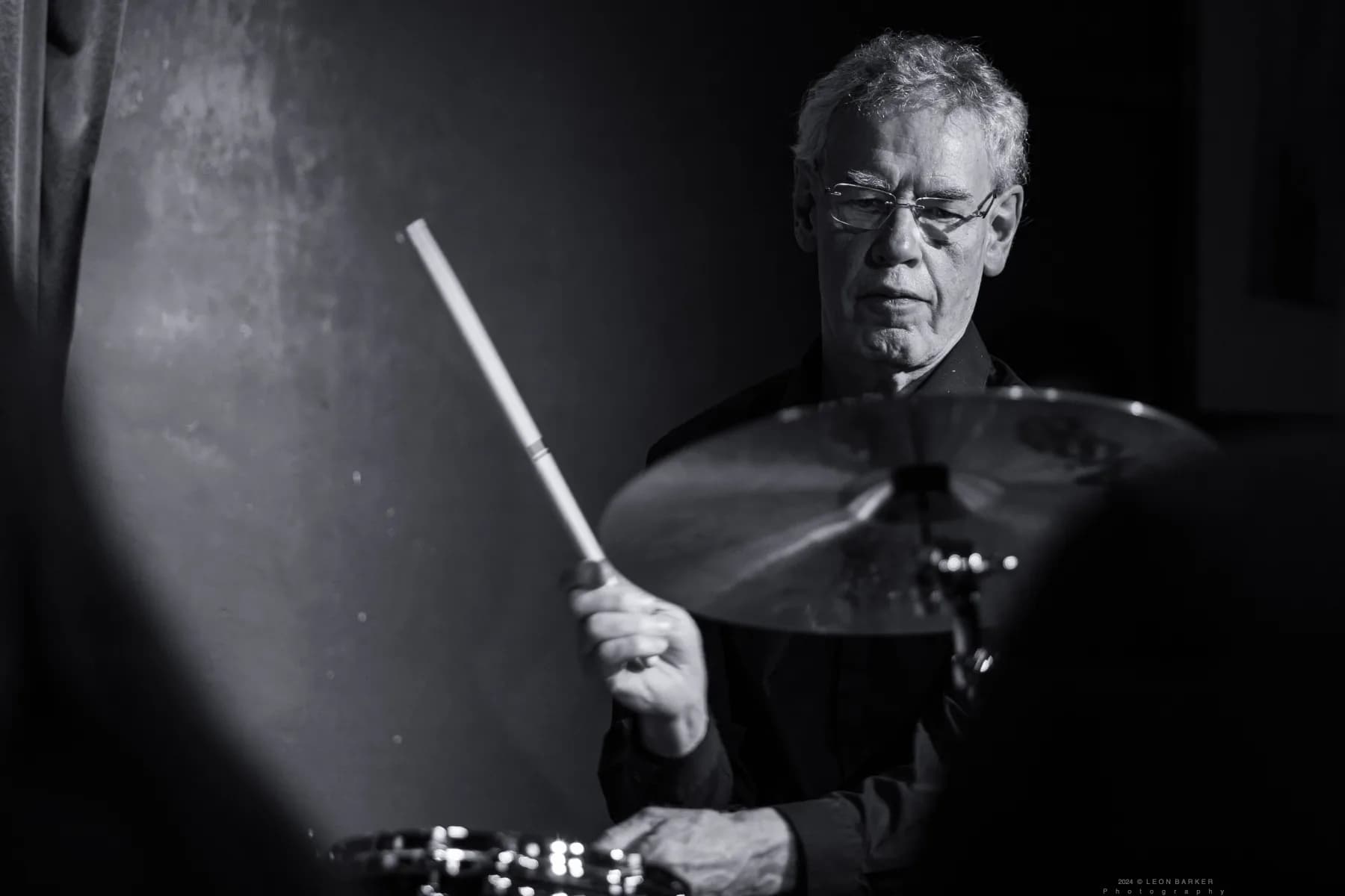 Bill Bruford playing drums during a Pete Roth Trio set.