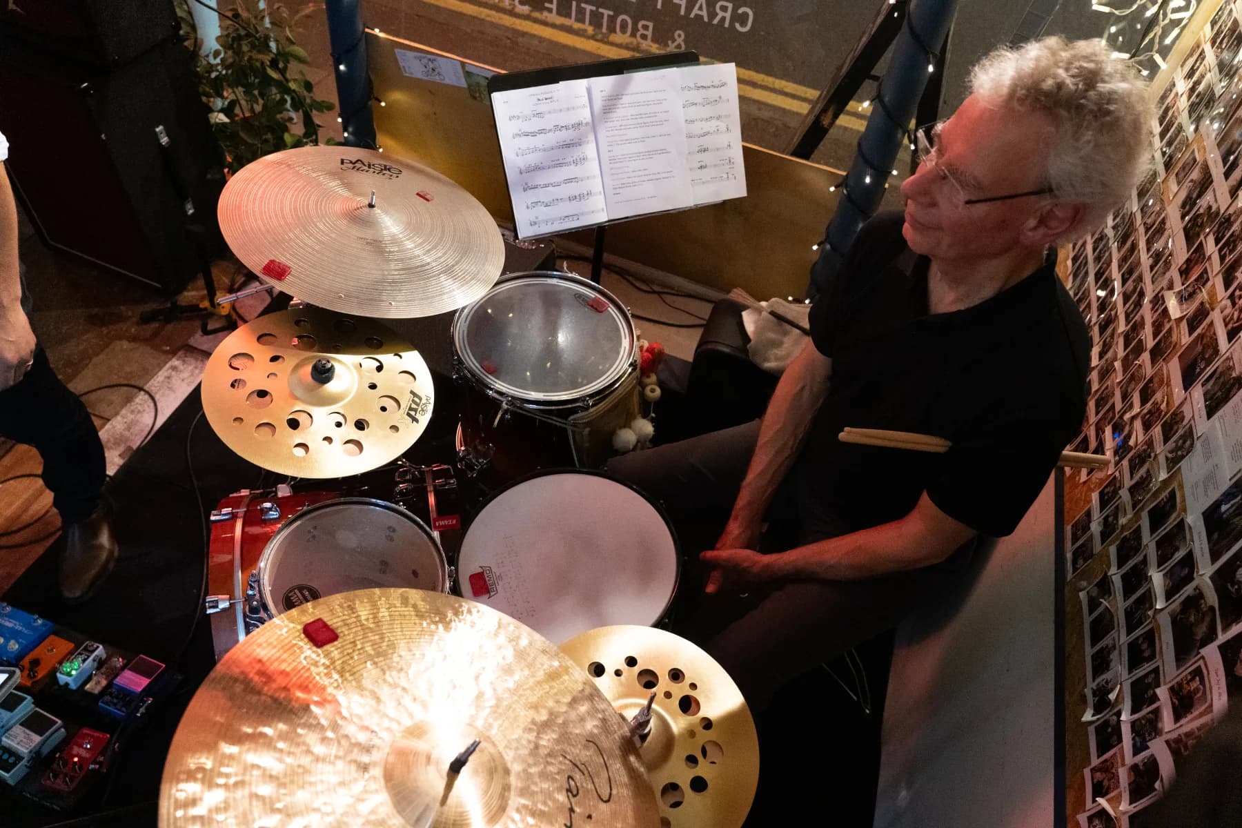 Pete Roth Trio musician caught in a spotlight during a live set.