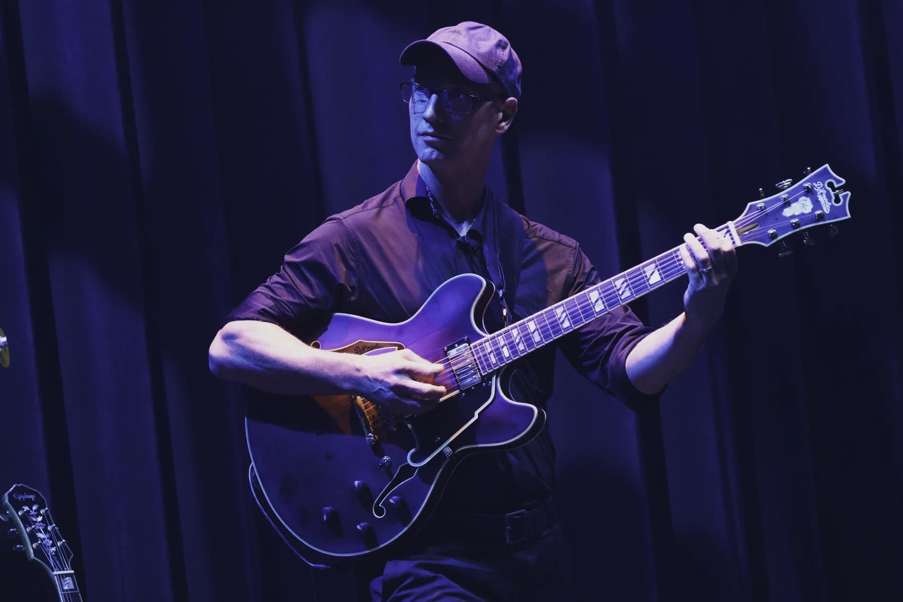Pete Roth Trio performance image with a musician in close focus.